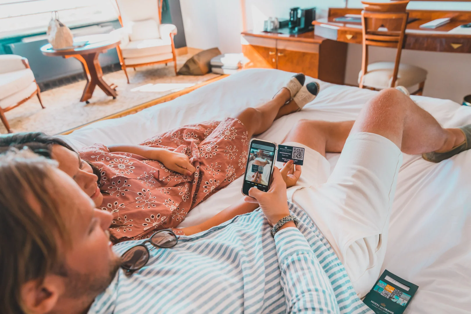 Hotel guest orders room service via QR code on smartphone